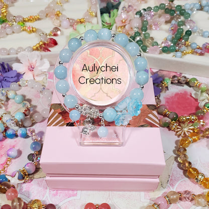 Blue Chalcedony Gemstone Bracelet with Silver Flower Charm