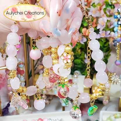 Rose Quartz Gemstone Bracelet with Green Glass Peach Charm