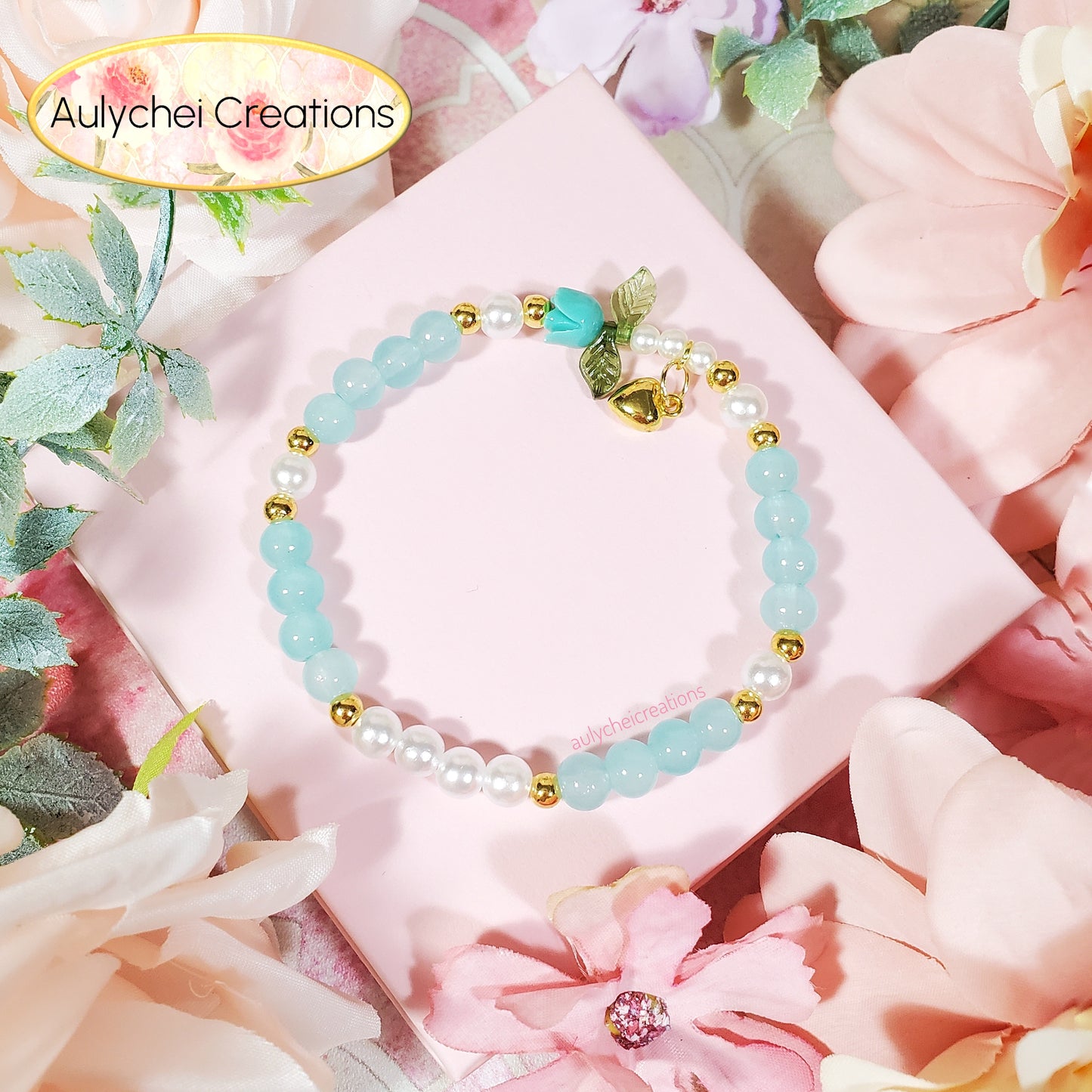 Light Teal Bud Glass Beaded Charm Bracelet