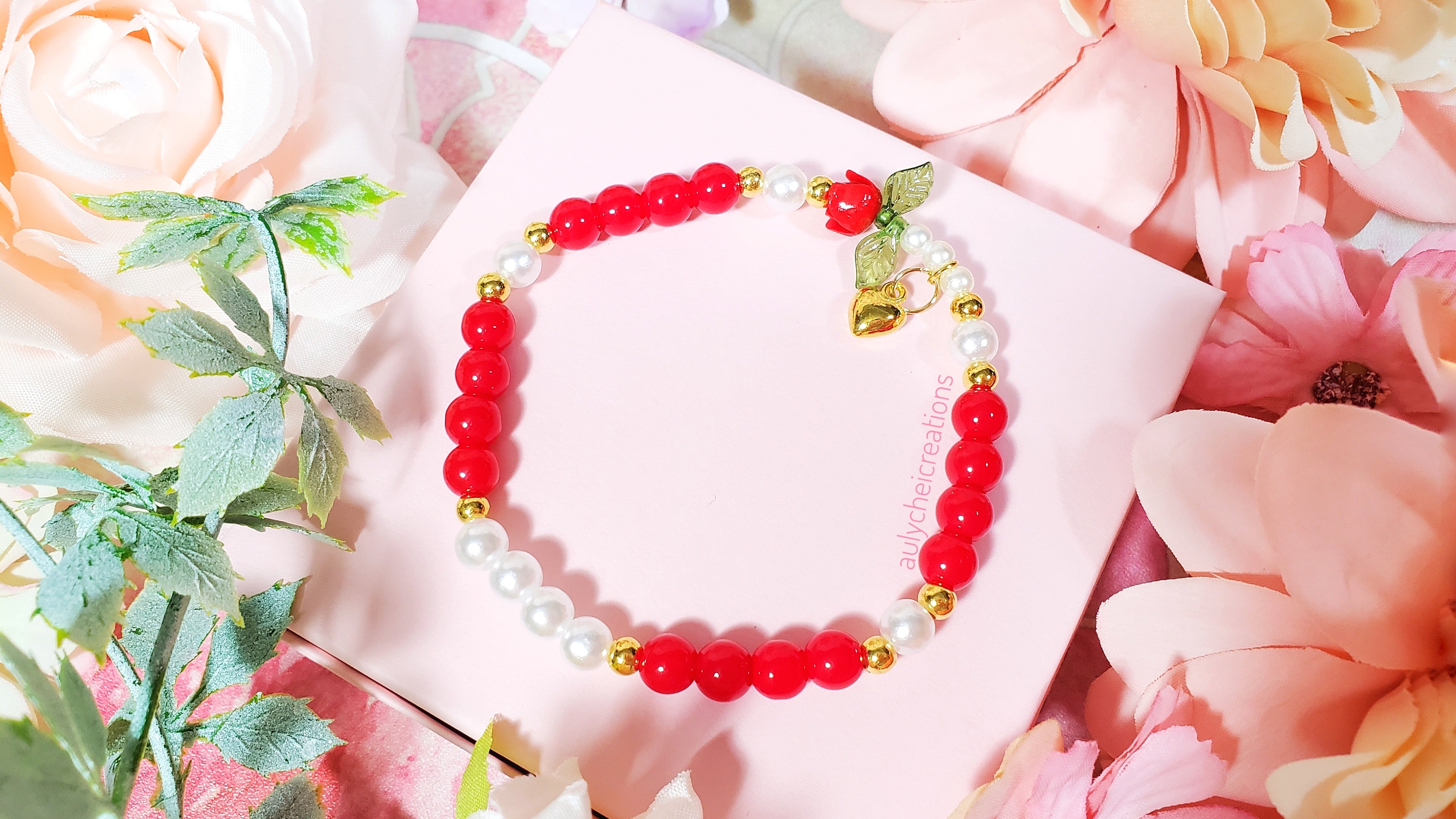 red rose bud charm bracelet